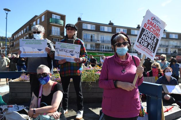 Pro-migrant supporters during a 'solidarity stand' in the Market Square, Dover on Saturday. 