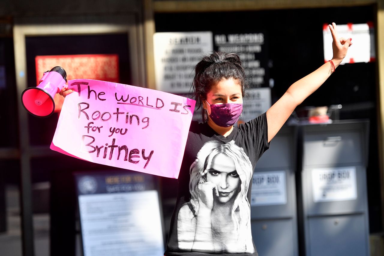 A supporter of Britney Spears gathers with others outside a courthouse in downtown LA for a #FreeBritney protest as a hearing regarding singer's conservatorship is in session on July 22, 2020.