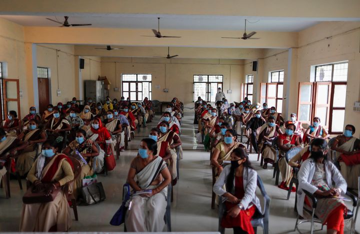 Health workers attend a training session on handling the coronavirus pandemic in villages in Fatehpur, Uttar Pradesh, June 3, 2020. 