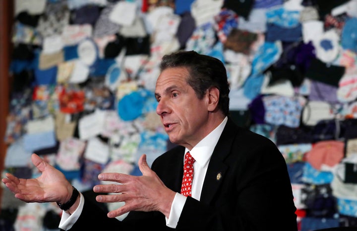 New York Governor Andrew Cuomo speaks in front of a mural on April 29, 2020. New York is among several states facing revenue shortfalls that, absent help from Congress, are likely to inflict financial pain throughout the state. REUTERS/Mike Segar