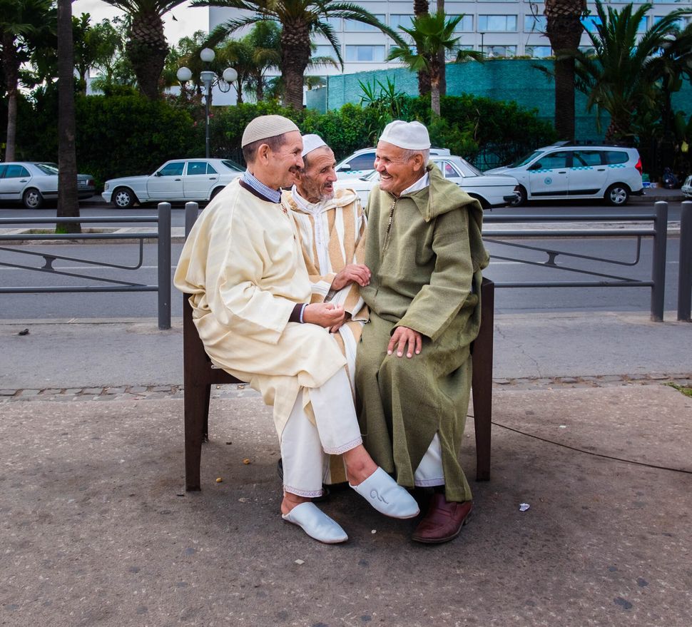 Three men and a bench in Casablanca, but during two very different times. Close physical contact is a large part of Moroccan culture. Above: June 15, 2016 | Below: Aug. 1, 2020