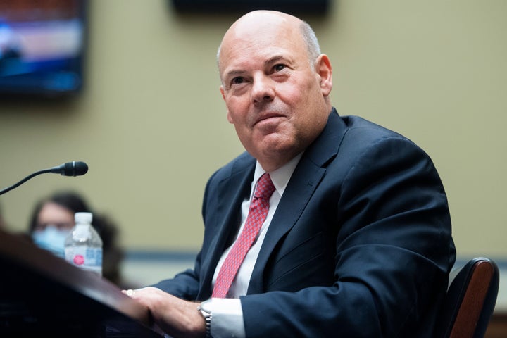 Postmaster General Louis DeJoy testifies during a House Oversight and Reform Committee hearing on Aug. 24. The U.S. Postal Service has been in turmoil ever since DeJoy assumed his position in June.