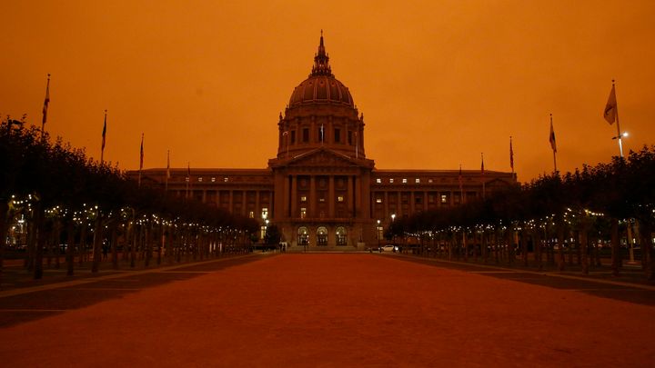 San Francisco City Hall under a sky glowing orange due to wildfire smoke on Sept. 9, 2020. 