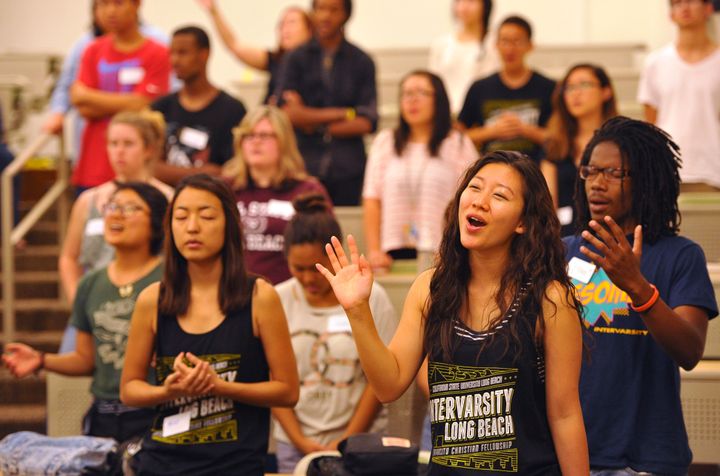 InterVarsity Christian Fellowship members worship during a weekly meeting at California State University Long Beach in September 2014.