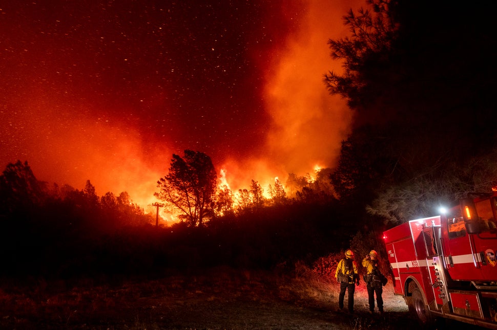 Firefighters watch the Bear Fire approach in Oroville, California on Wednesday. The blaze, part of the lightning-sparked Nort