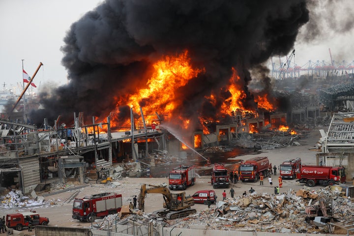 Fire burns in the port in Beirut, Lebanon, Thursday, Sept. 10. 2020. (AP Photo/Hussein Malla)