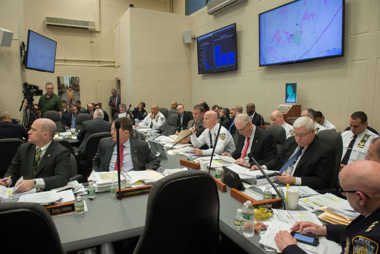 CompStat sessions, like this one in 2016, could be crucial for commanders seeking to impress top NYPD leaders, such as then-Chief of Department James O’Neill (center, in white shirt), who would later be appointed police commissioner. (Bryan R. Smith/The New York Times via Redux) 