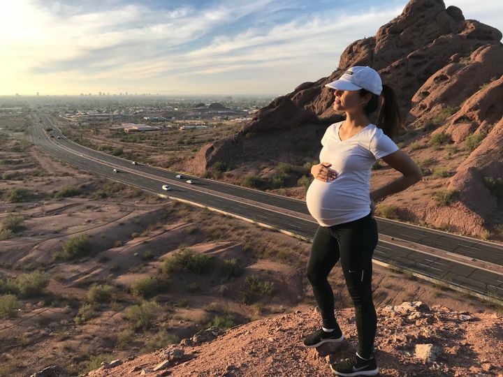 Staying connected to the land is an Indigenous value which permeates all aspects of life, including pregnancy. Here, the author, Chelsey Luger, is hiking in Tempe, AZ, while pregnant with her first child. 
