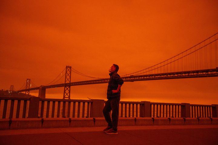 Smoke from the Northern California wildfires casts a reddish color over the Embarcadero in San Francisco on Sept. 9, 2020.