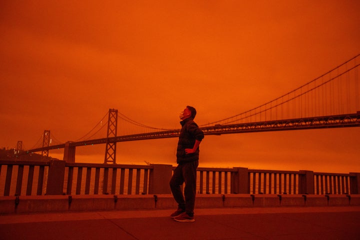 Smoke from the Northern California wildfires casts a reddish color over the Embarcadero in San Francisco on Sept. 9, 2020.