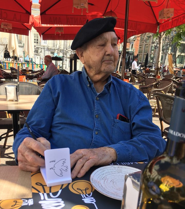 The author's father sketching the author's mother at Plaza de Santa Ana in Madrid, Spain, in March. He died of COVID-19 later in the month.