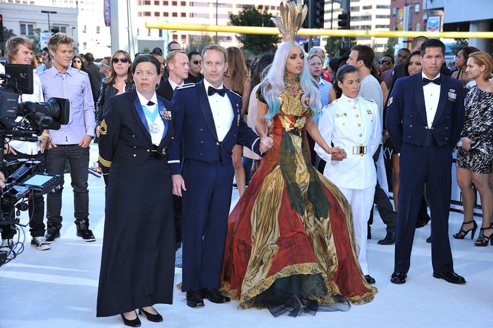 Gaga in her original VMAs outfit, with four LGBTQ veterans