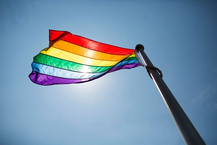 The Pride flag flies above city hall in Toronto, Ont.