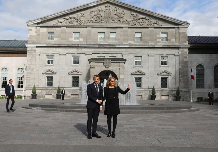 French President Emmanuel Macron is welcomed by Governor General of Canada Julie Payette at Rideau Hall on June 6, 2018 in Ottawa. 