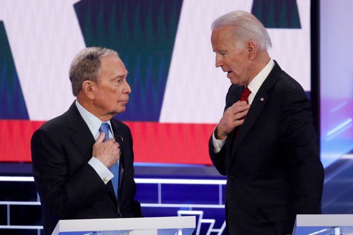 Democratic presidential candidates, former New York City Mayor Mike Bloomberg, left, and former Vice President Joe Biden talk during a break in a Democratic presidential primary debate Wednesday, Feb. 19, 2020, in Las Vegas, hosted by NBC News and MSNBC. (AP Photo/John Locher)