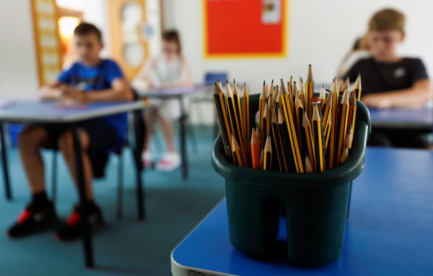 A container full of pencils is pictured in a classroom at Watlington Primary School during the last day of school, amid the coronavirus disease (COVID-19) outbreak, in Watlington , Britain, July 17, 2020. REUTERS/Eddie Keogh
