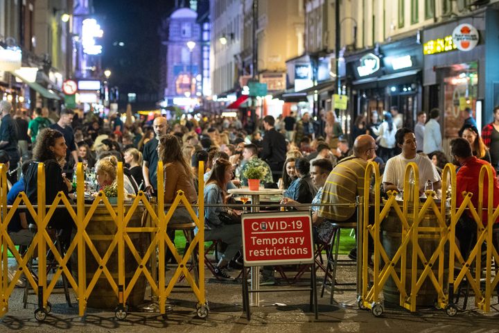 People enjoying a night out in Soho, in London's West End on Sunday night.