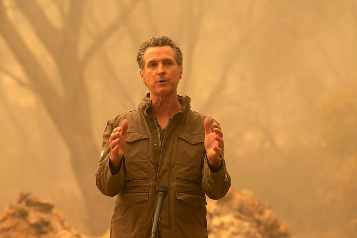 California Gov. Gavin Newsom speaks to the media after he toured the North Complex Fire zone in Butte County on Friday, Sept. 11, 2020, outside of Oroville, Calif. Gov. Gavin Newsom toured the fire-ravaged region Friday and strongly asserted that climate change was evident and pledged to redouble efforts to “decarbonize” the economy. (Paul Kitagaki Jr./The Sacramento Bee via AP, Pool)