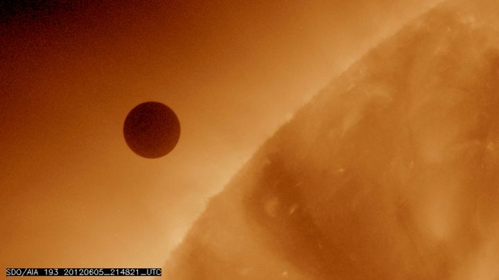 The planet Venus at the start of its transit of the Sun, June 5, 2012.