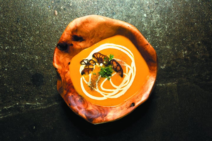 Mena Massoud's butternut squash soup from <i>Evolving Vegan</i>.