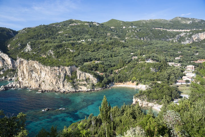 CORFU - OCTOBER 04: Paleokastritsa beach resort - blue sky, cliffs and turquoise Ionian Sea in Corfu, Ionian Islands, Greece (Photo by Tim Graham/Getty Images)