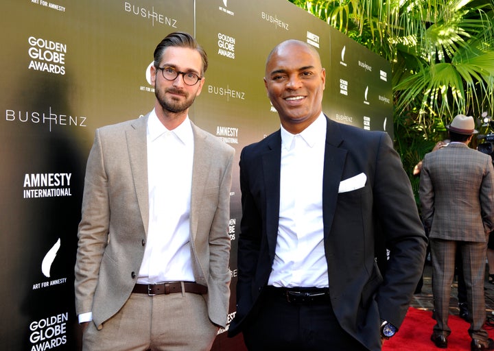 Christopher Renz and Gerard Bush attend an Art for Amnesty brunch in 2016.