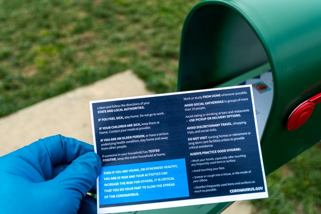 The back of the postcard featured guidelines on good hygiene and social