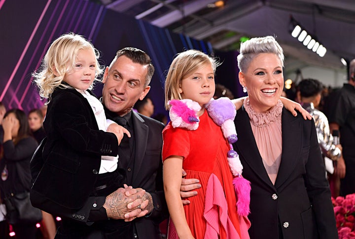 Carey Hart and Pink with their children, Jameson and Willow Sage Hart, at the 2019 E! People's Choice Awards red carpet.