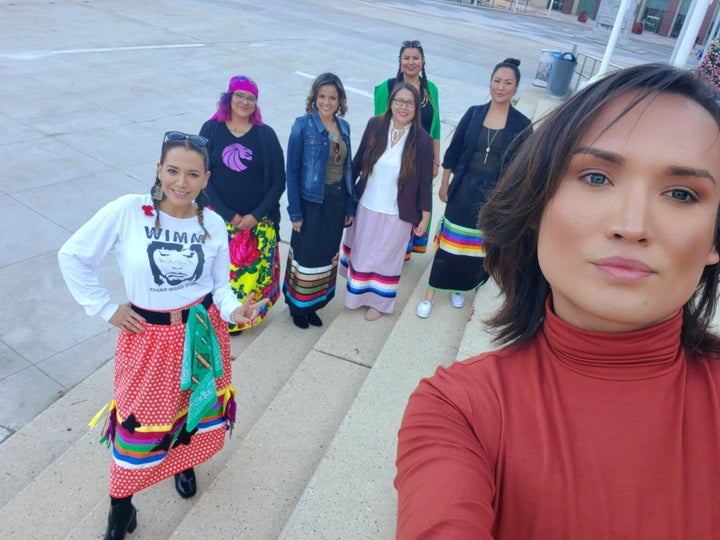 Swampy (near left), Rabbit (right), and other women consider ribbon skirts a symbol of Indigenous resilience.