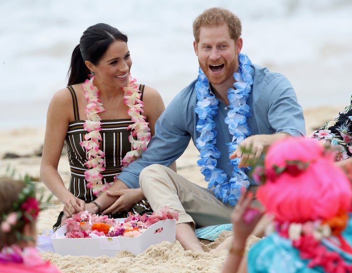 Prince Harry and Meghan Markle enjoying themselves at South Bondi Beach in Sydney, Australia on Oct. 19. 2018.