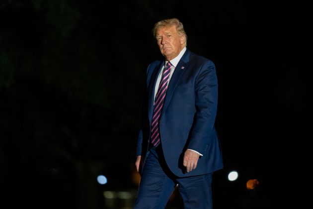 President Donald Trump walks on the South Lawn as he arrives at the White House, Monday, Sept. 14, 2020, in Washington from a trip to Phoenix. (AP Photo/Manuel Balce Ceneta)