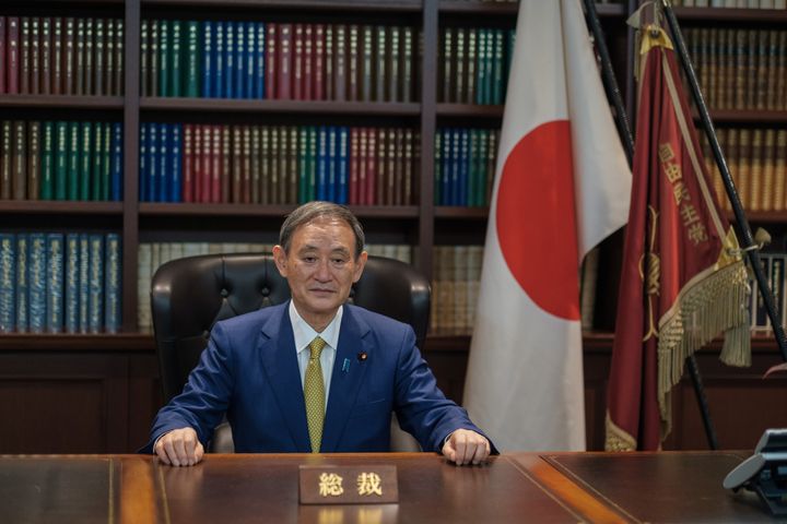 Yoshihide Suga poses for a picture following his press conference at LDP (Liberal Democratic Party) headquarters, in Tokyo on September 14, 2020.