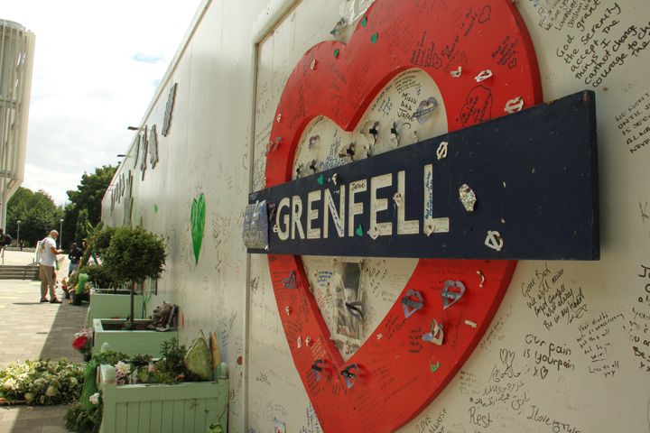 A love-hear shaped Grenfell board at the memorial site during the 3rd anniversary. 