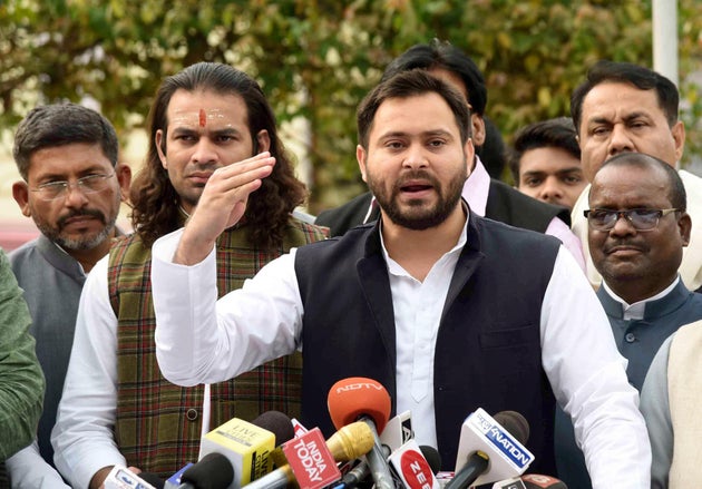 RJD leader Tejashwi Yadav and his brother Tej Pratap Yadav in file