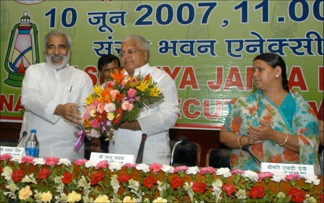 Rashtriya Janta Dal (RJD) President Lalu Prasad Yadav with Raghuvansh Prasad Singh and Rabari Devi in...
