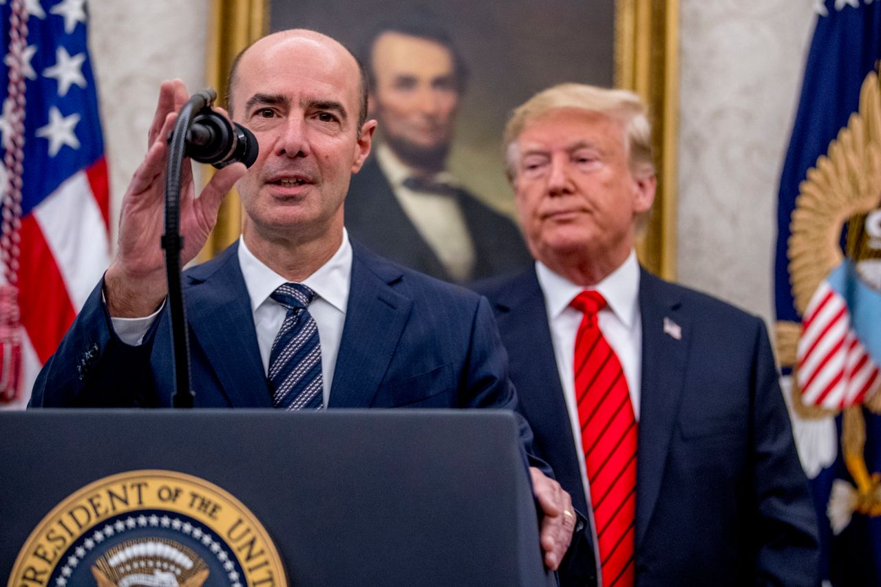 Under Labor Secretary Eugene Scalia, shown here with President Donald Trump, the department has been reluctant to crack down on employers over coronavirus hazards.