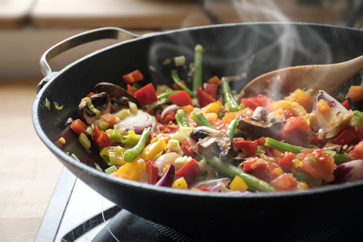 Toss your takeout into a wok and stir fry it up with fresh vegetables from your fridge or freezer.