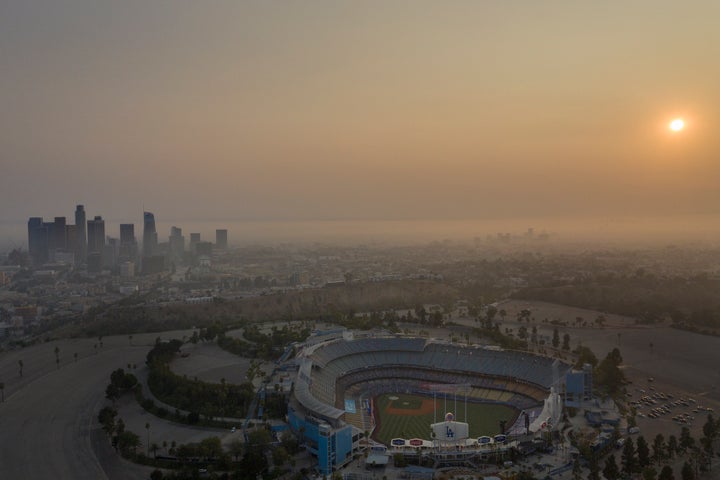 Professionals have to recognize when it's no longer OK to push through work during a disaster. Above, the Los Angeles skyline and sunset is obscured by smoke, ash and smog on Sept. 14., 2020.