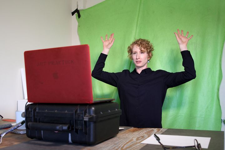Lisa Wymore, a professor of dance, theater and performances studies at University of California, Berkeley leads warm-ups for an online course in Berkeley, California, U.S., March 12, 2020. 