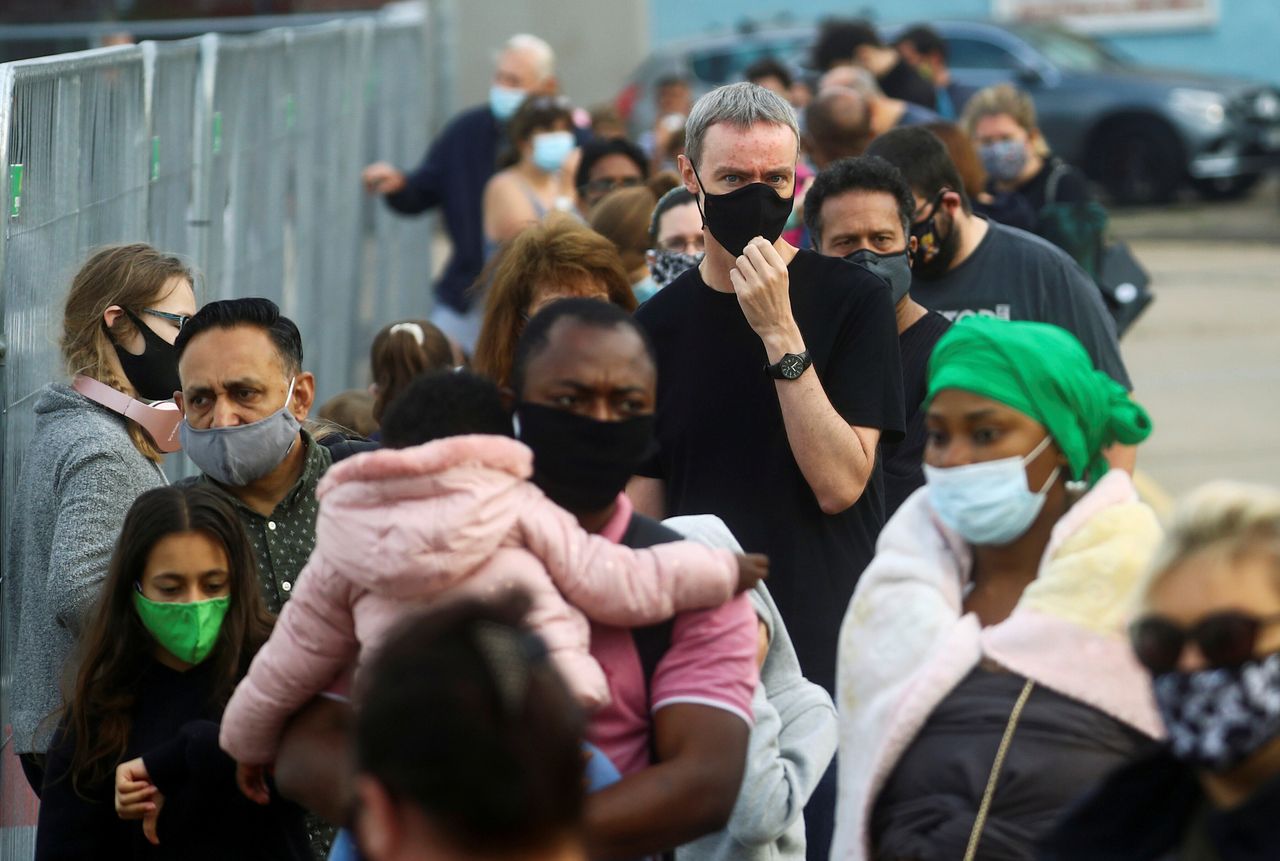 People queue at a test centre following an outbreak of the coronavirus disease (COVID-19) in Southend-on-sea