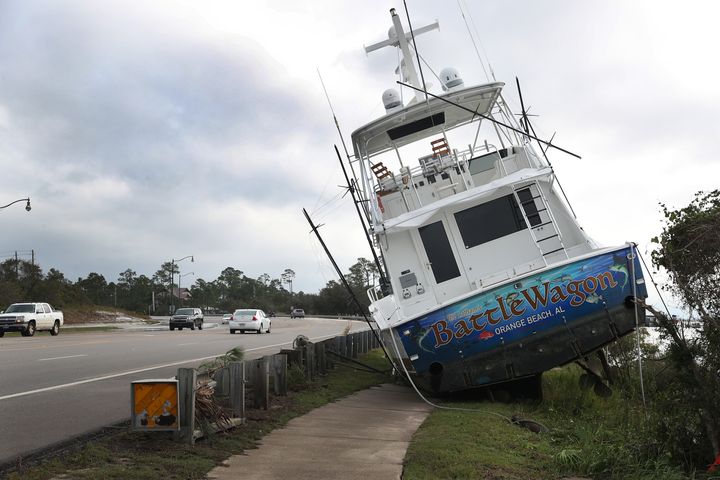A boat is seen washed up on shore after Hurricane Sally. 