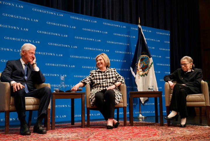 Former President Bill Clinton, left, former Secretary of State Hillary Clinton and Supreme Court Justice Ruth Bader Ginsburg