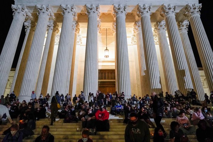Mourners gathered on the steps of the Supreme Court.