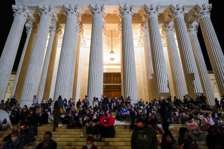 Mourners gathered on the steps of the Supreme Court.