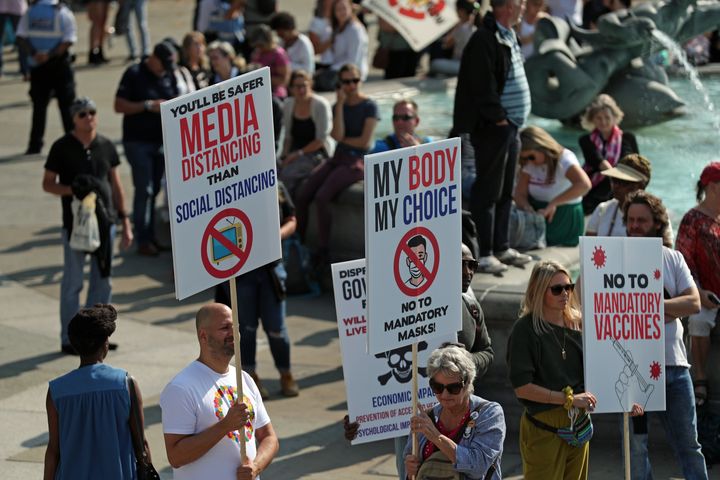 Demonstrators at an anti-vax protest in London's Trafalgar Square.