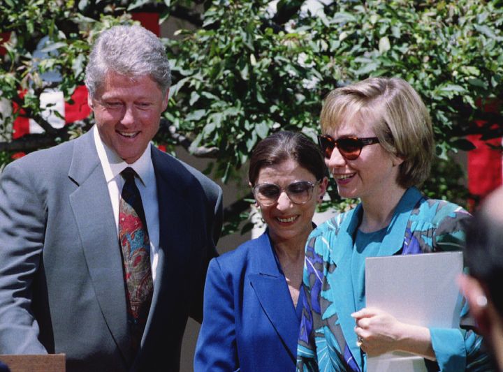 President Bill Clinton escorts his newly named Supreme Court nominee, Judge Ruth Bader Ginsburg, from the podium following the Rose Garden announcement on June 14, 1993.