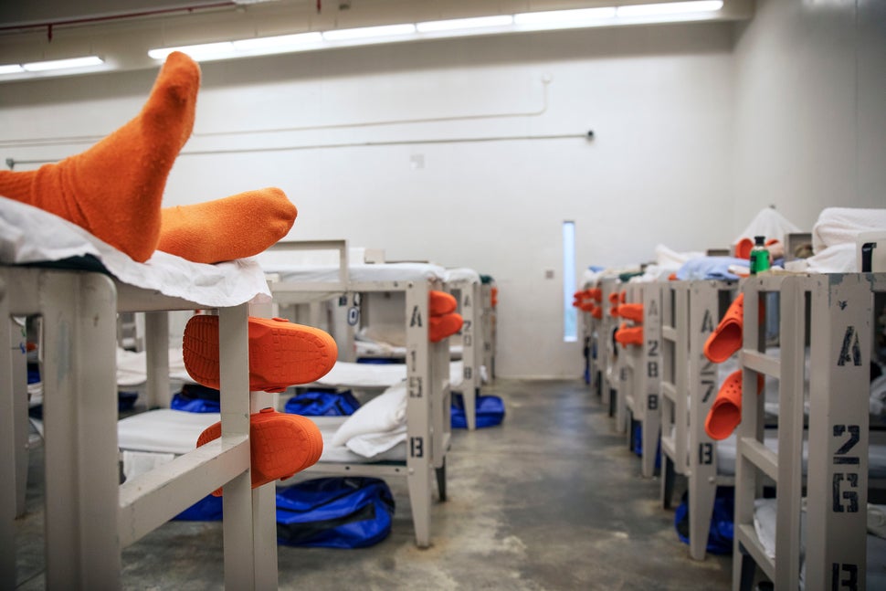 A detainee lays on a dormitory bunk at a detention centre in Lumpkin, Ga. on Nov. 15, 2019.