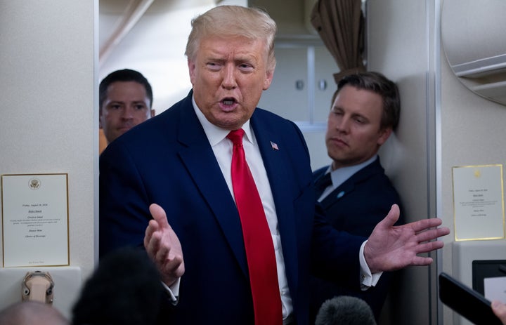 Bill Stepien (standing to the left of President Donald Trump on Air Force One) took a big pay cut the same month he was promoted to campaign manager.