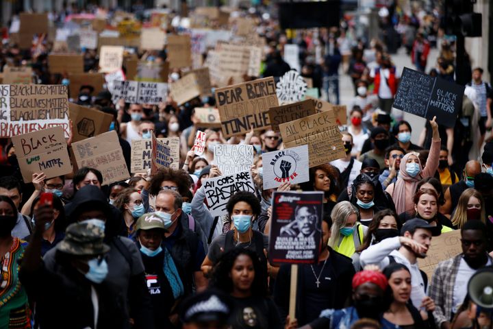 People march to Westminster during a Black Lives Matter protest following the death of George Floyd in Minneapolis police custody