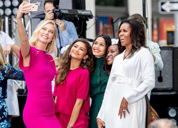 Zendaya and Michelle Obama pose for a selfie with Karlie Kloss and Freida Pinto in 2018.